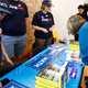 Voters sign up to support Yang.